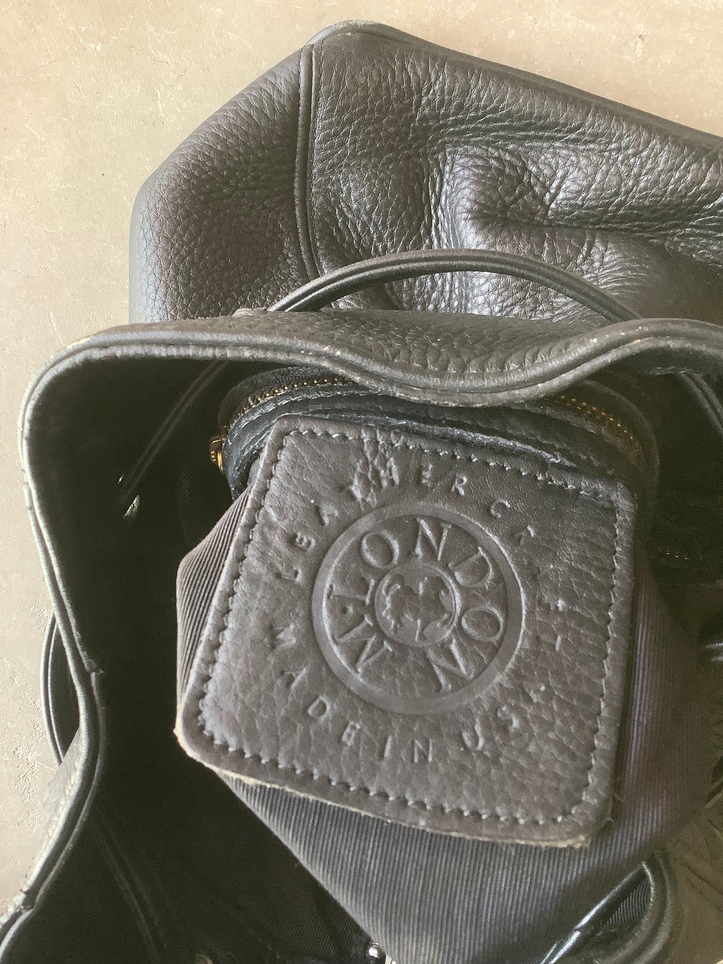 Black pebbled leather backpack