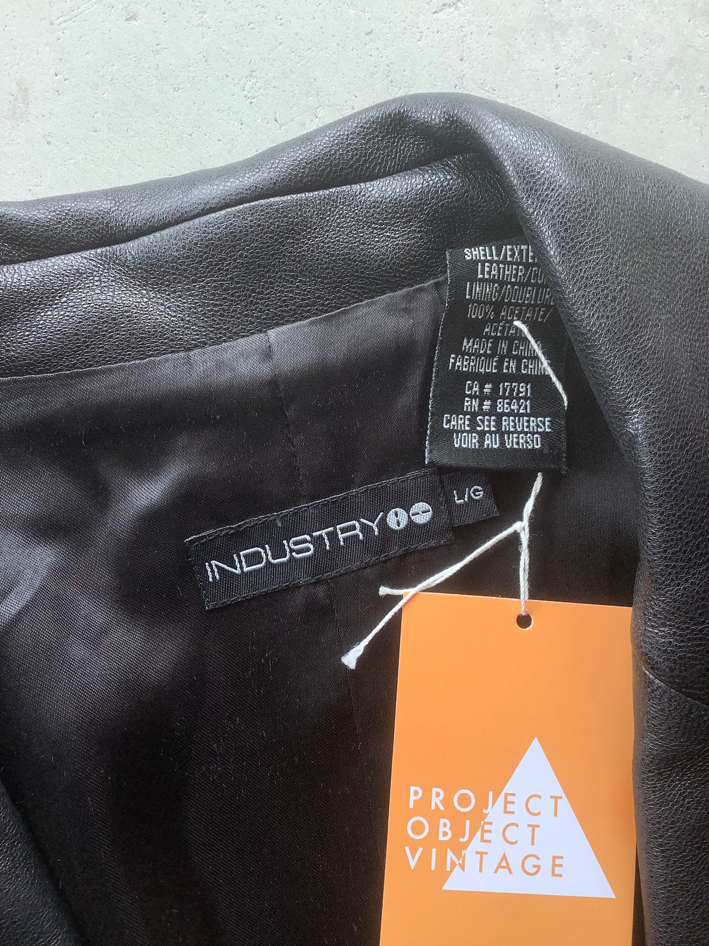 Black leather button-up jacket