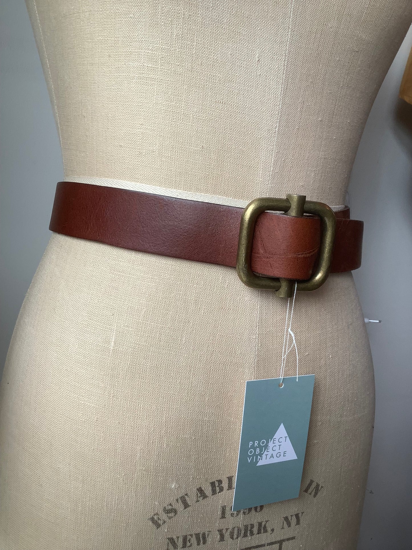 Brown leather and chunky brass belt