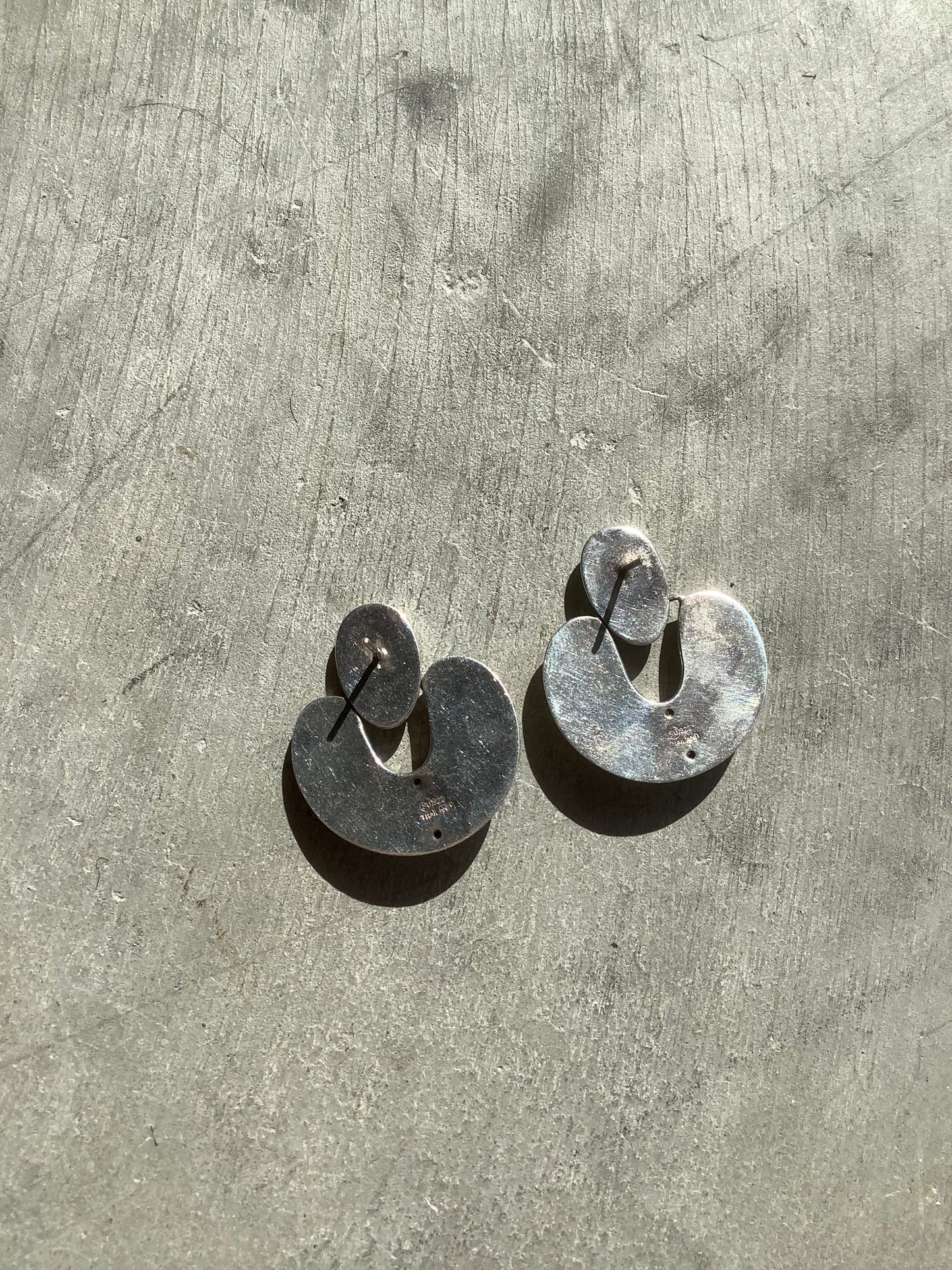 Sterling silver puffy door knocker earrings