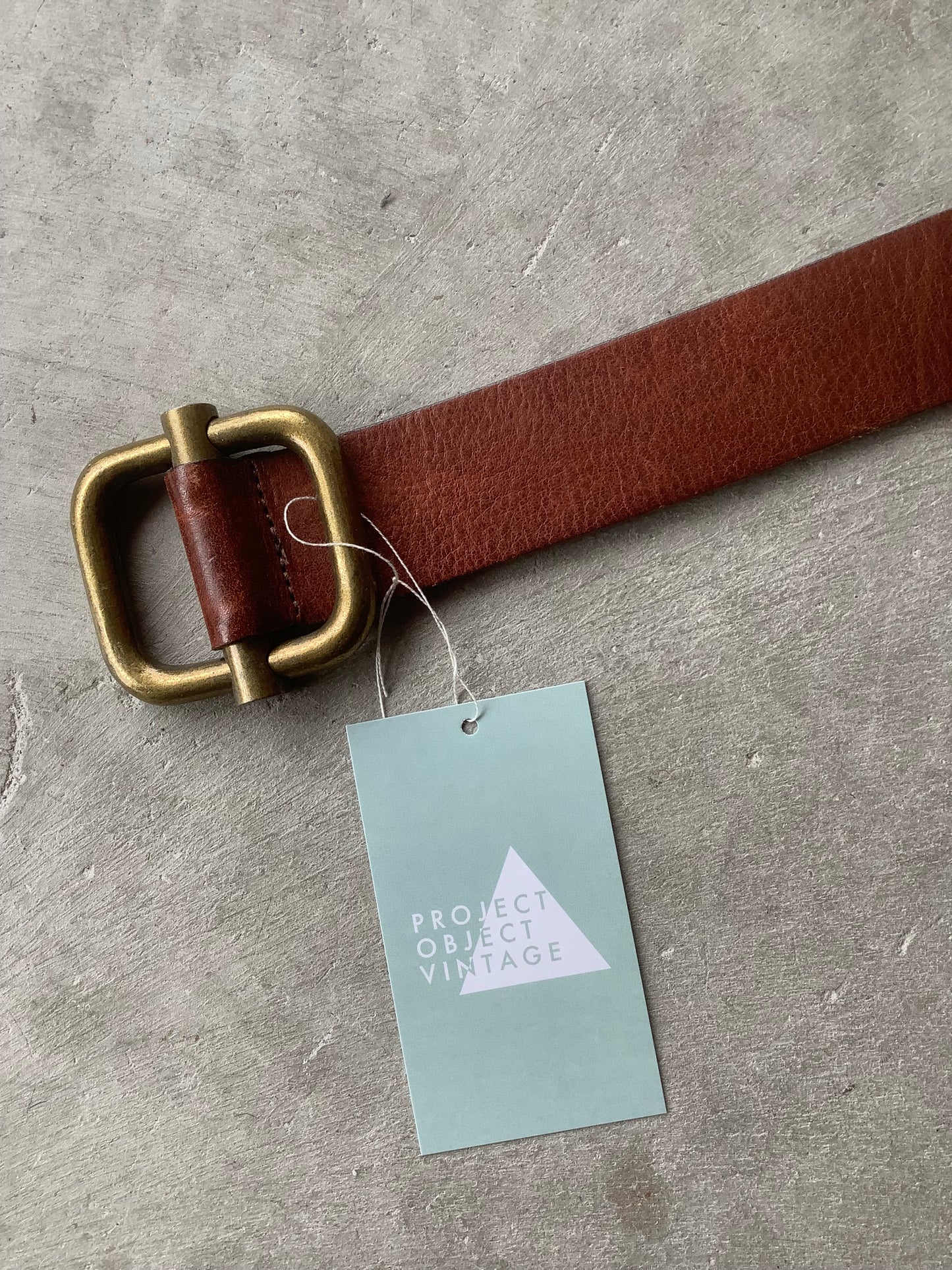 Brown leather and chunky brass belt