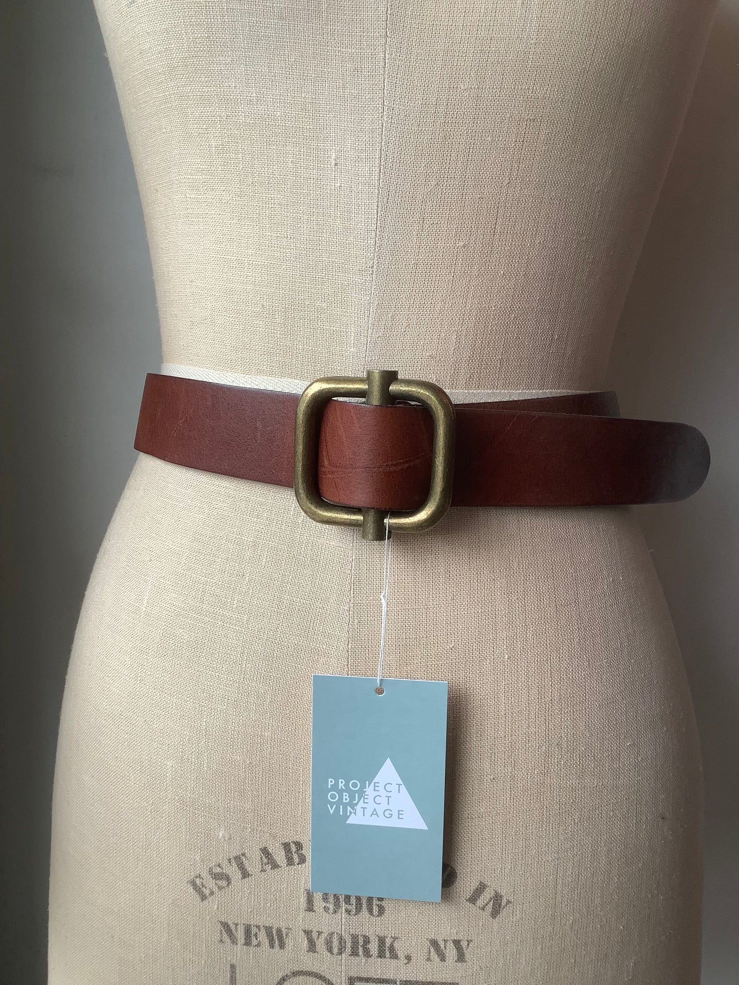 Brown leather and chunky brass belt