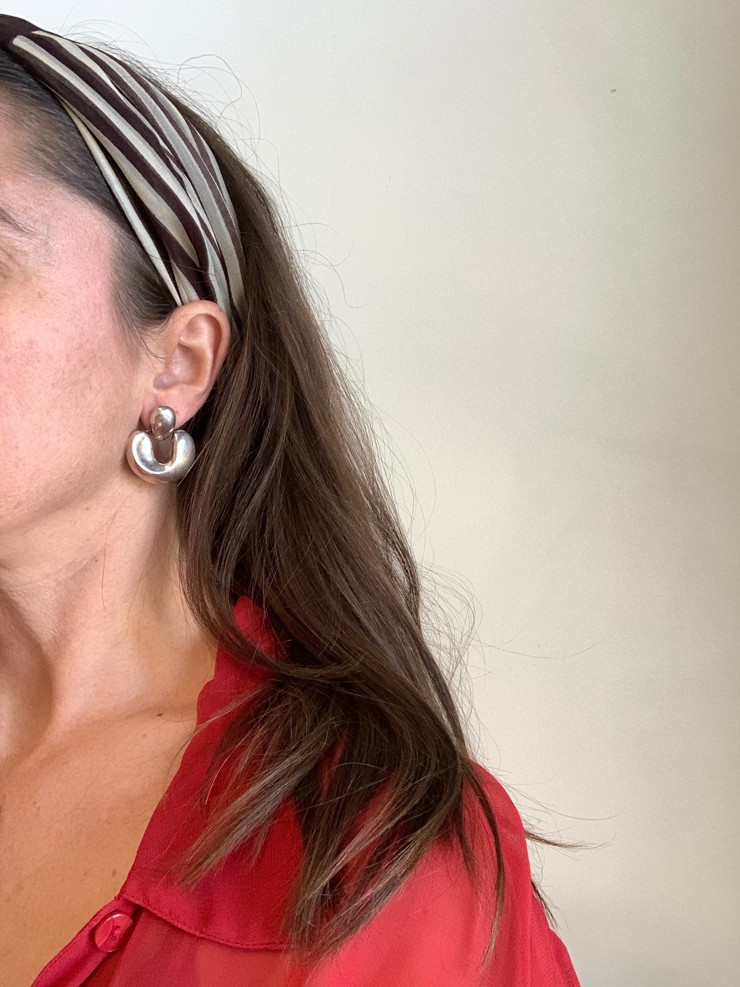 Sterling silver puffy door knocker earrings