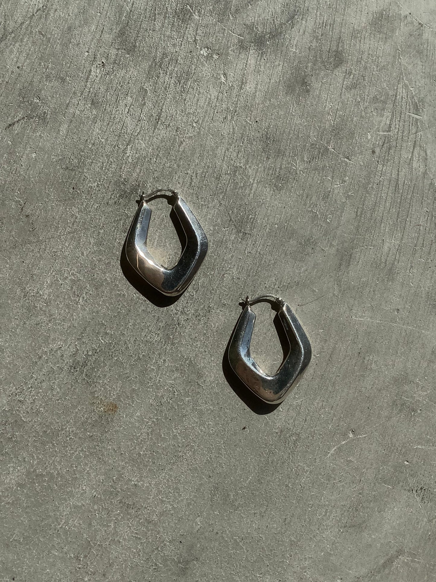 Sterling silver puffy diamond hoops