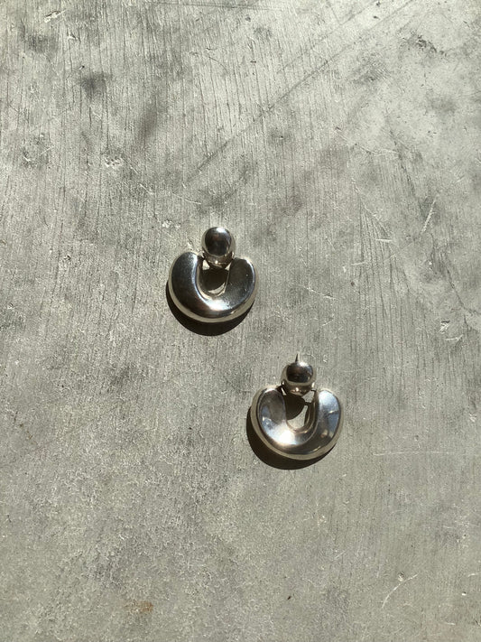 Sterling silver puffy door knocker earrings