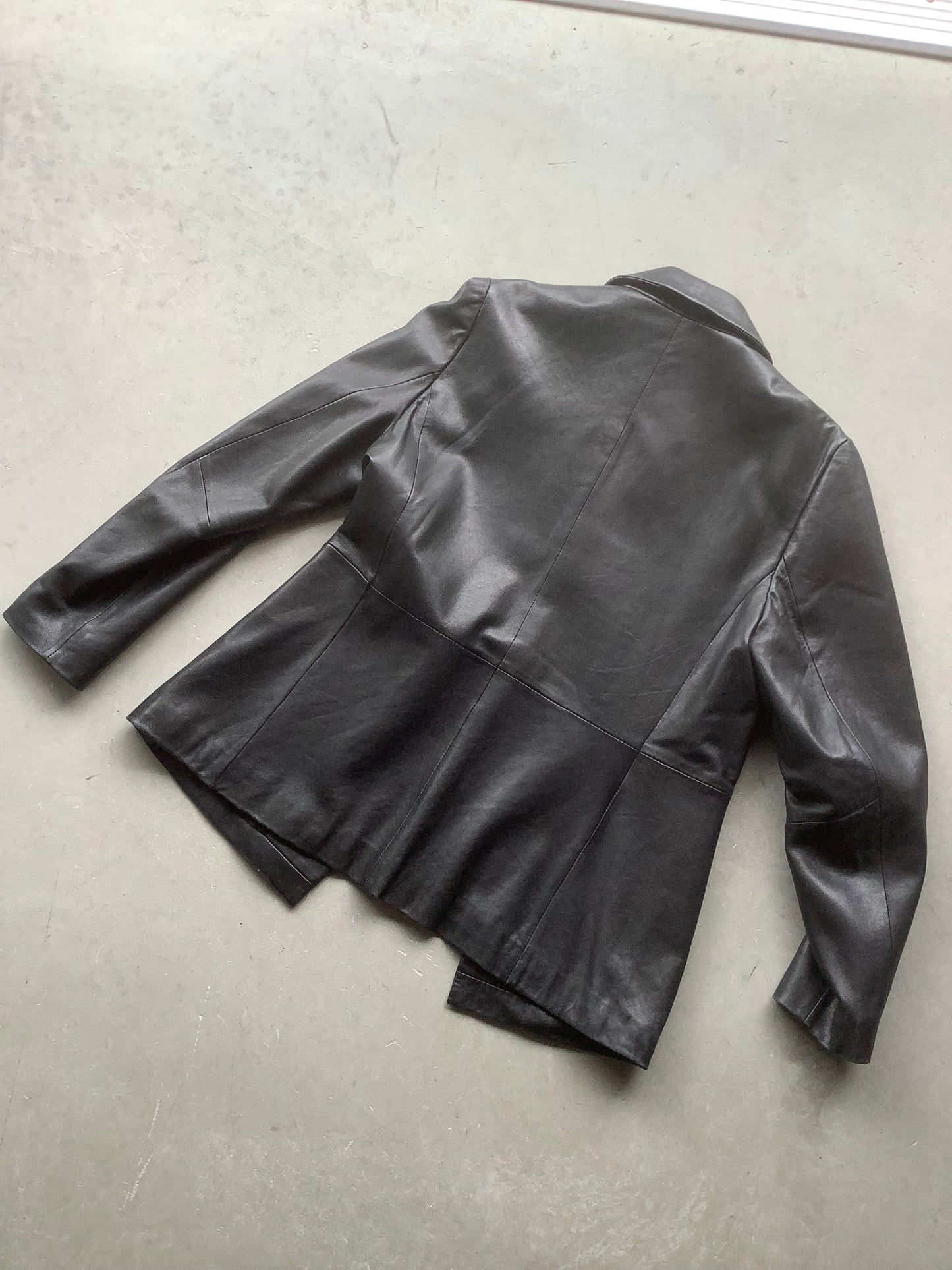 Black leather button-up jacket