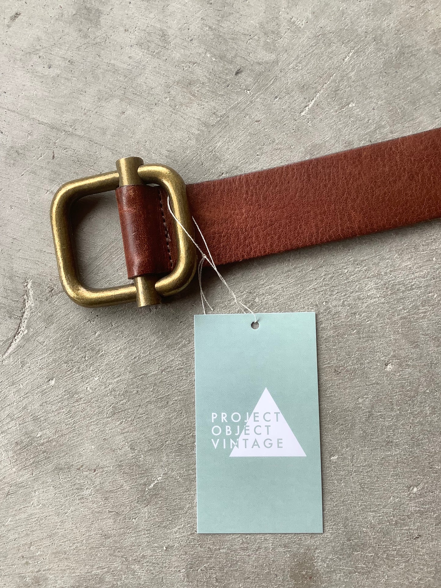 Brown leather and chunky brass belt