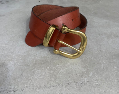Brown leather belt with gold buckle